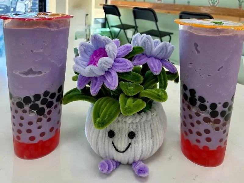 Two taro milk teas with popping boba
